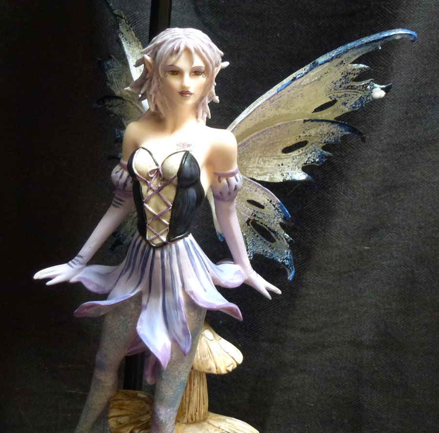 fairy on mushroom statue