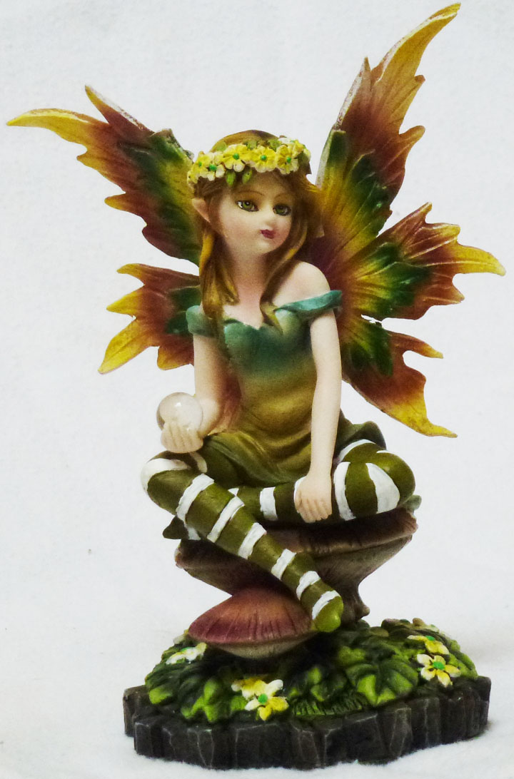 fairy on mushroom statue