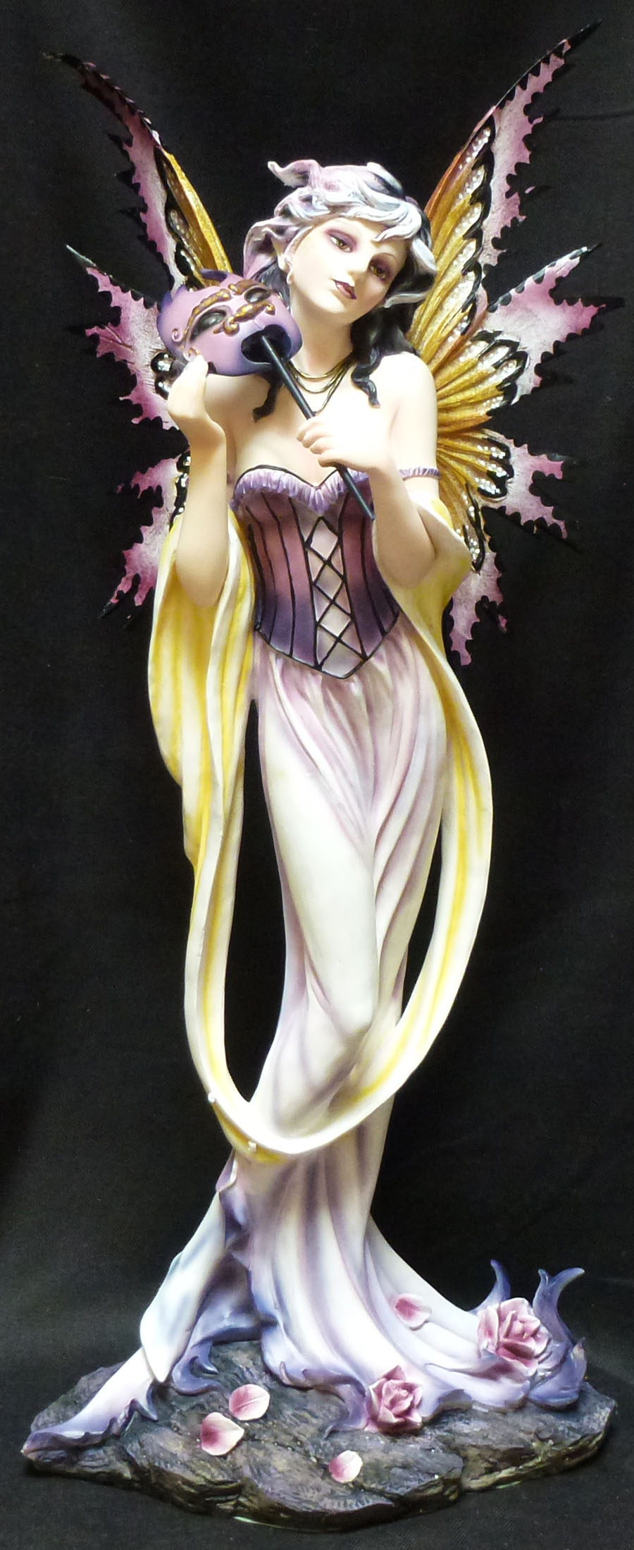 purple fairy figurine