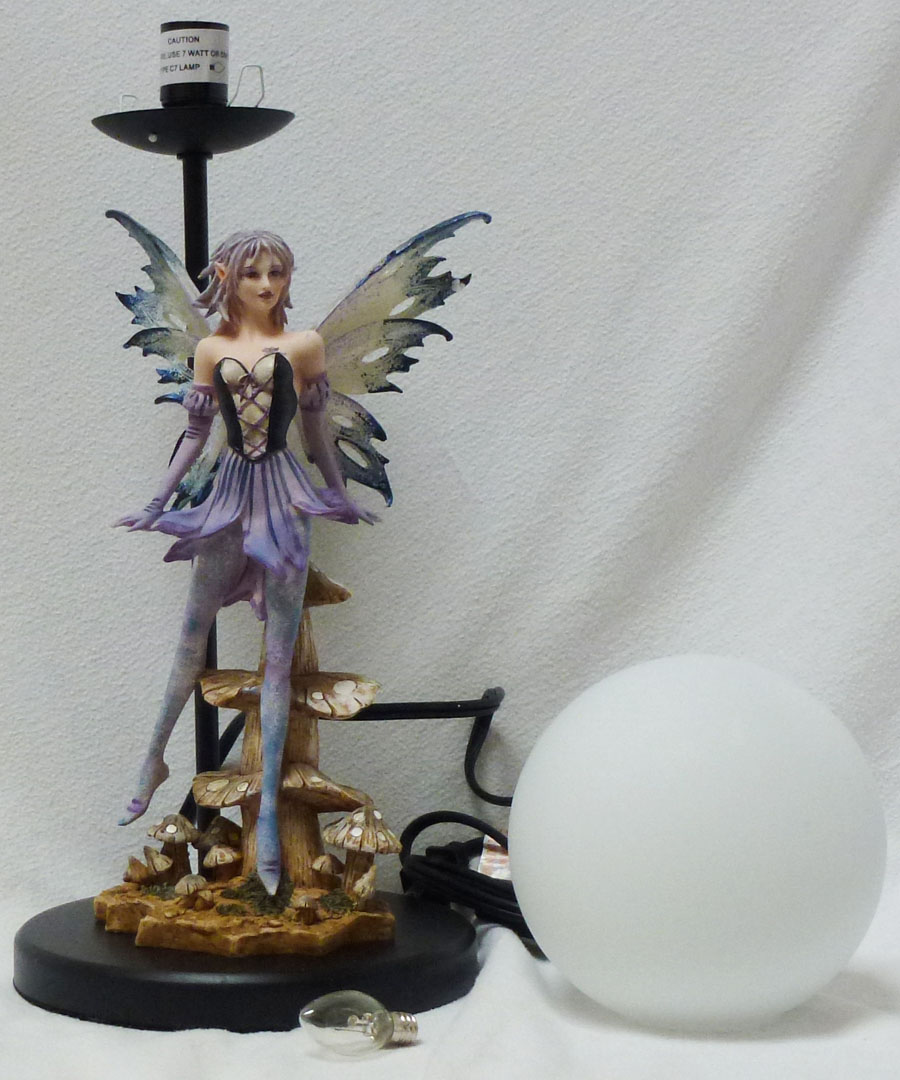 mushroom fairy statue